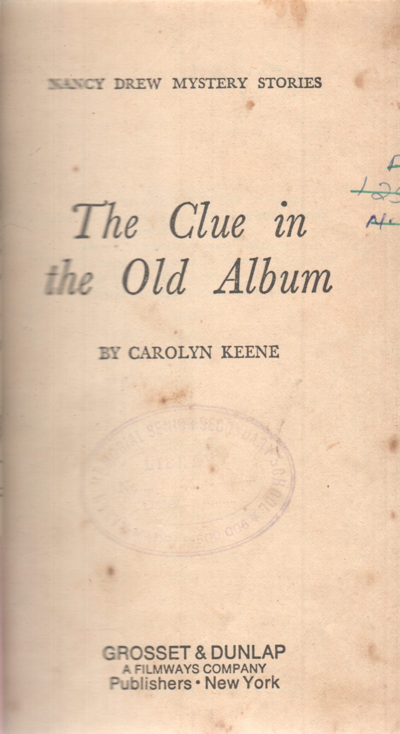 THE CLUE IN THE OLD ALBUM BY CAROLYN KEENE