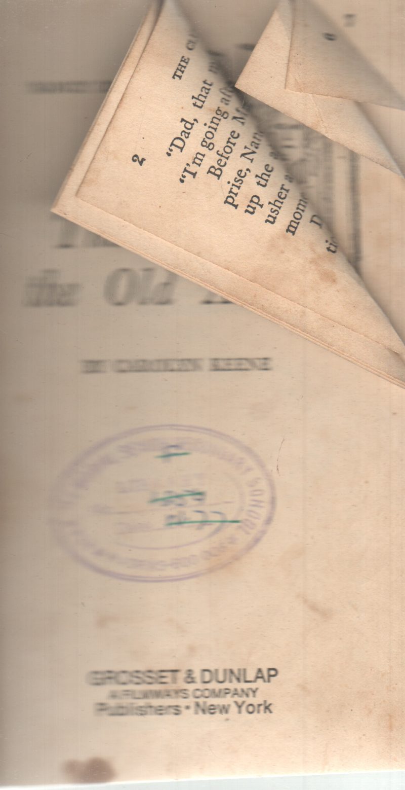 THE CLUE IN THE OLD ALBUM BY CAROLYN KEENE